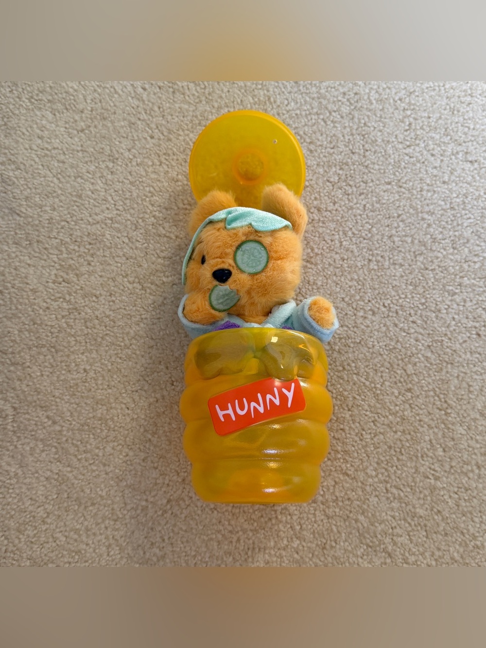 Winnie the Pooh plush in honey comb